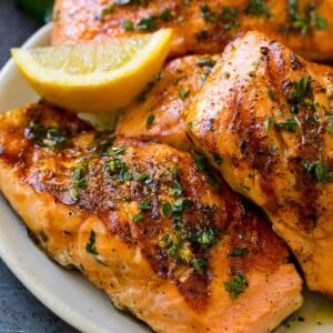Grilled marinated salmon fillets with lemon, garlic and herbs.