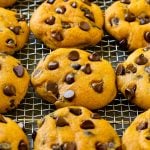 Pumpkin chocolate chip cookies on a cooling rack.