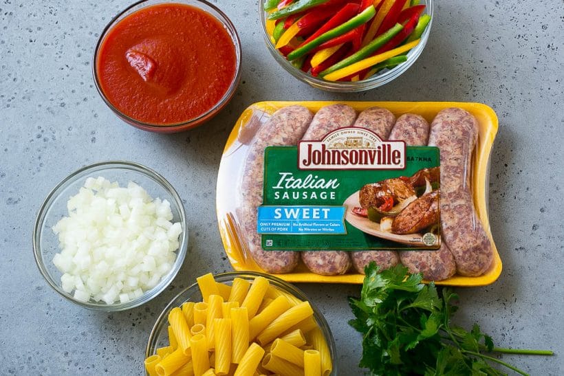 Ingredients for sausage and pepper pasta.