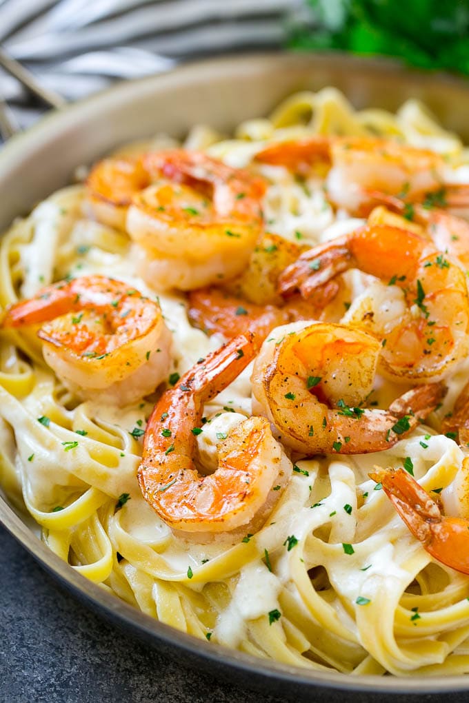 Shrimp alfredo pasta with creamy fettuccine, and sauteed shrimp.
