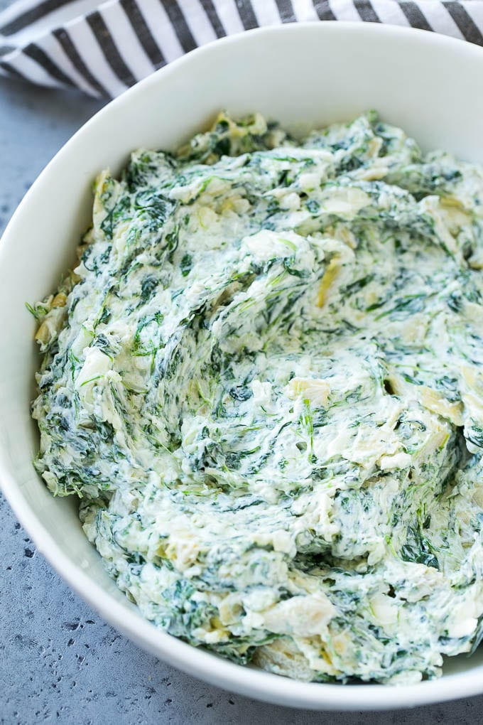 Homemade spinach artichoke dip in a bowl.