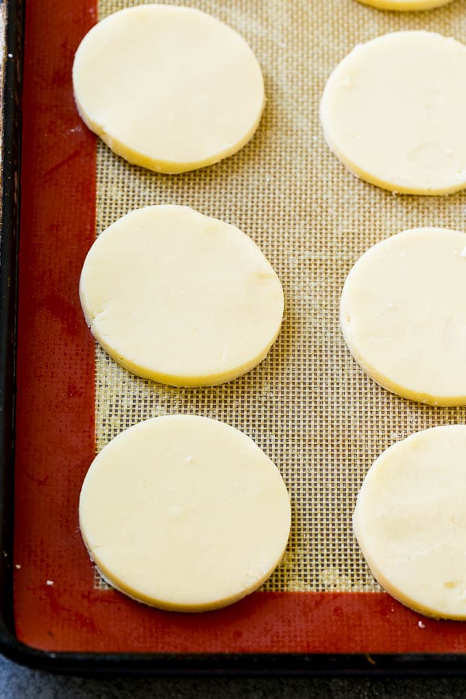 Shortbread cookie dough on a baking sheet.
