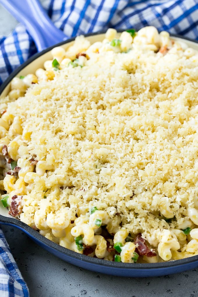 Macaroni and cheese topped with panko breadcrumbs and parmesan cheese.