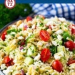 This Greek orzo salad is made with cucumbers, chickpeas, tomatoes, red onion, feta and herbs, all tossed in a herb dressing.