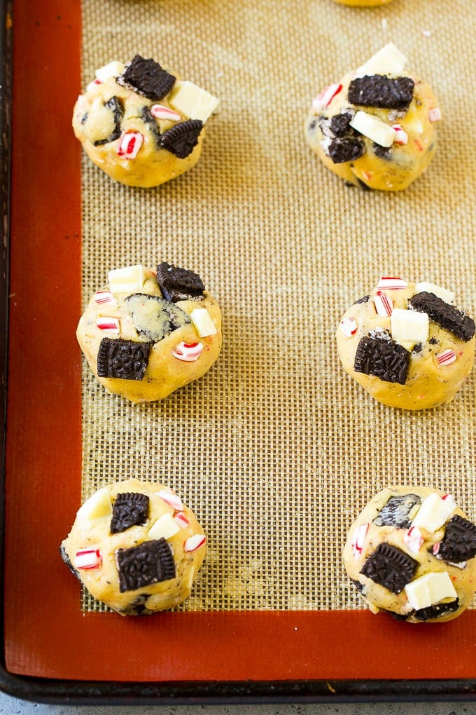 A sheet pan of unbaked cookies.