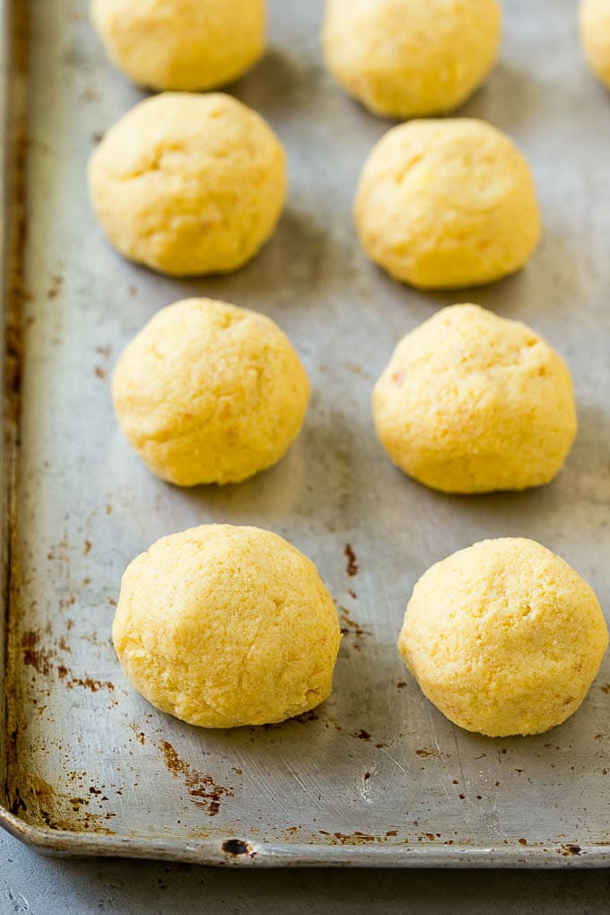 Cake balls on a sheet pan.