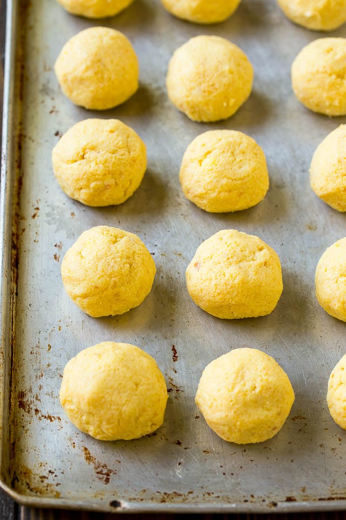 Cake balls on a sheet pan.