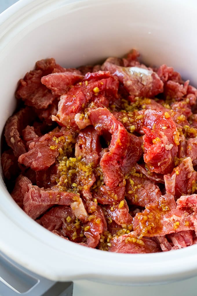 Flank steak strips in a soy, ginger and garlic sauce.