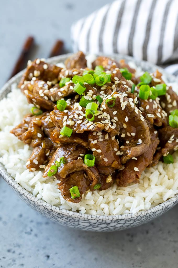 Slow cooker Korean beef served over steamed rice.