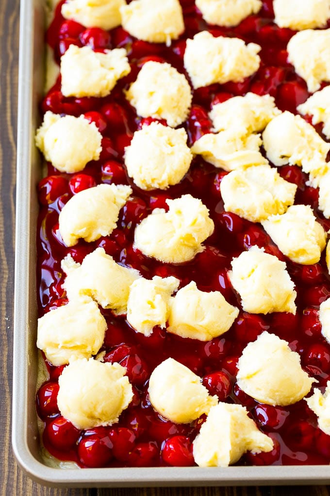Cherry pie filling with dollops of cookie dough on top.