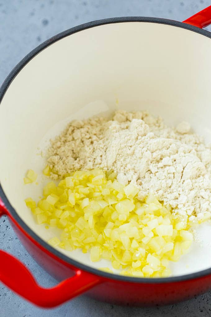 Sauteed onions and masa harina in a soup pot.