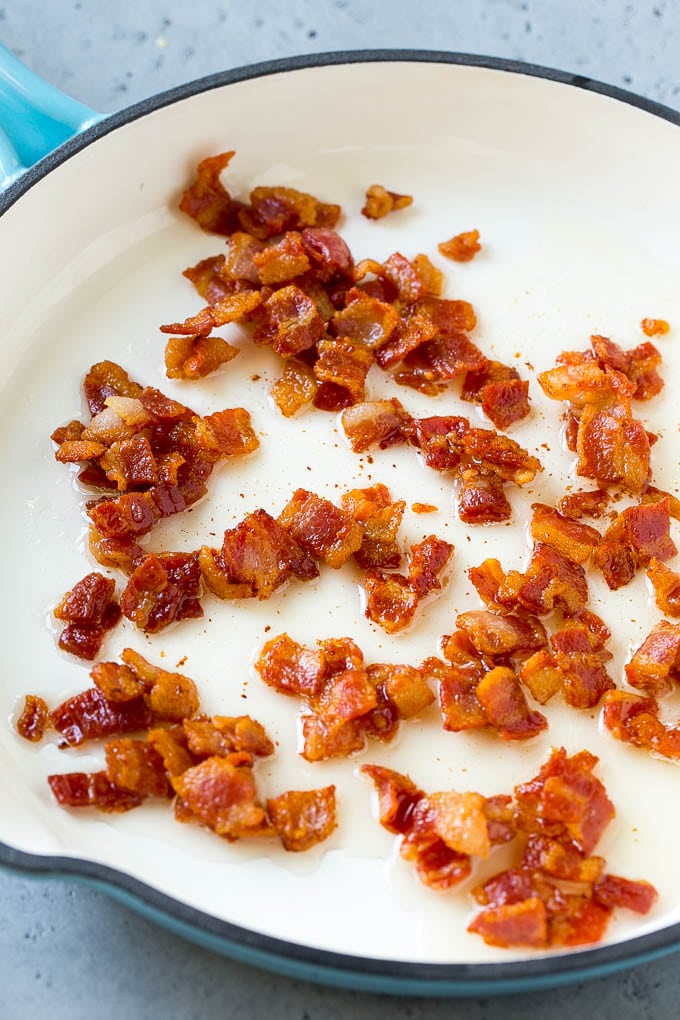 Cooked bacon in a skillet.