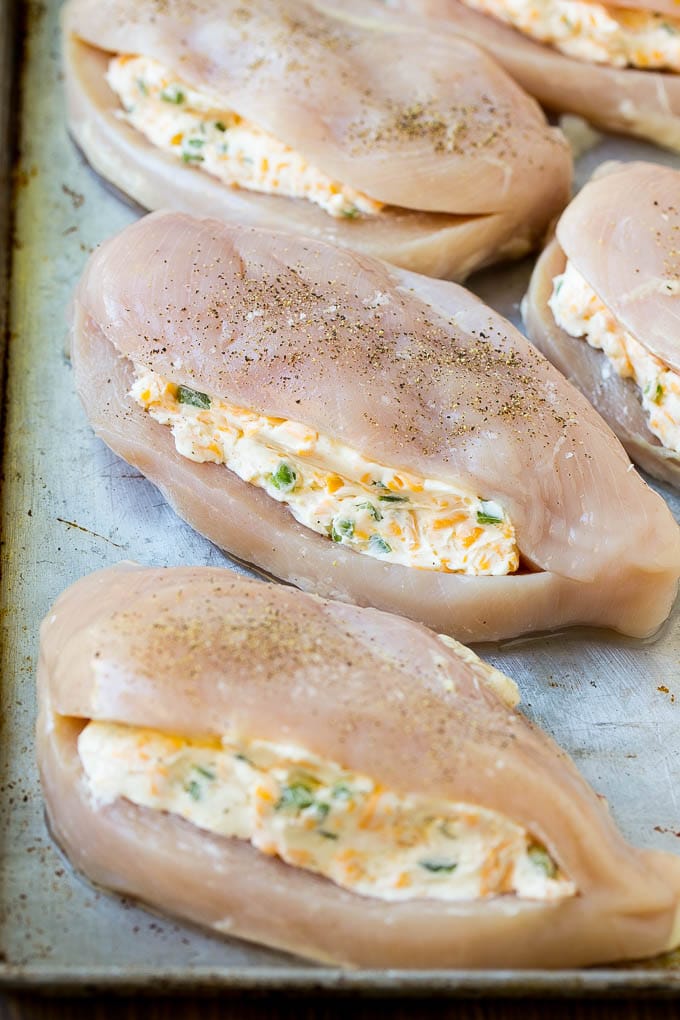 Chicken breasts filled with cream cheese, cheddar cheese and jalapenos.