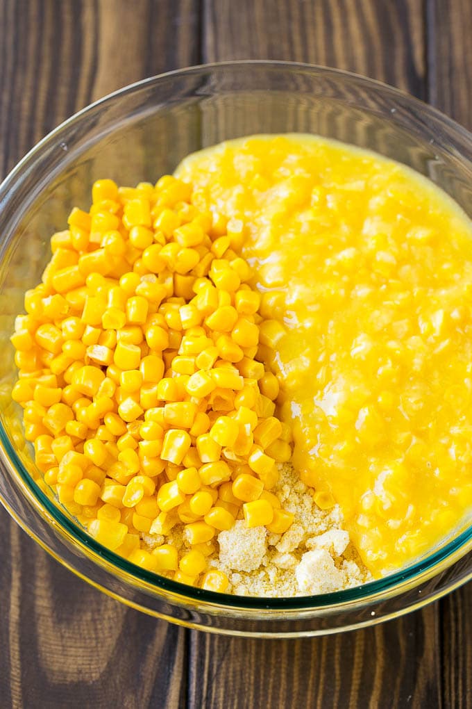 Cornbread mix, corn and creamed corn in a mixing bowl.