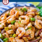 This recipe for Mexican shrimp cocktail (coctel de camarones) is fresh shrimp tossed in a homemade sauce with red onion, avocado, cilantro and jalapeno.