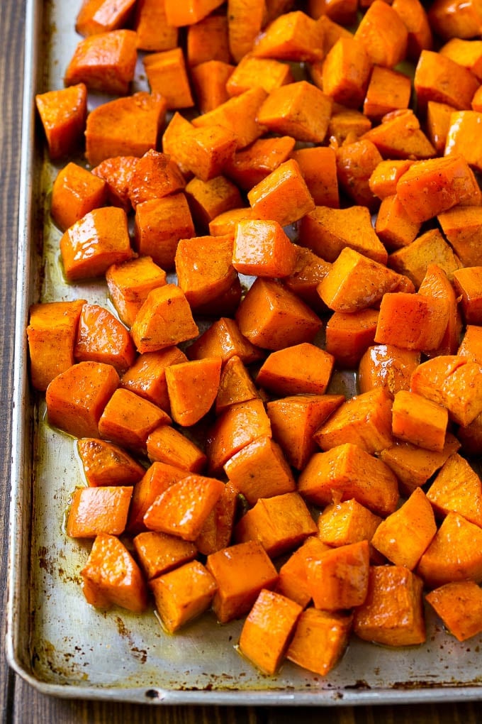 A sheet pan of roasted sweet potatoes.