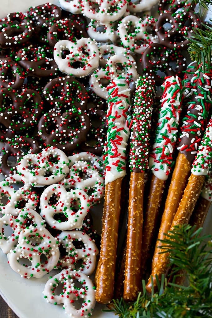 Chocolate covered pretzel twists and rods on a serving platter.