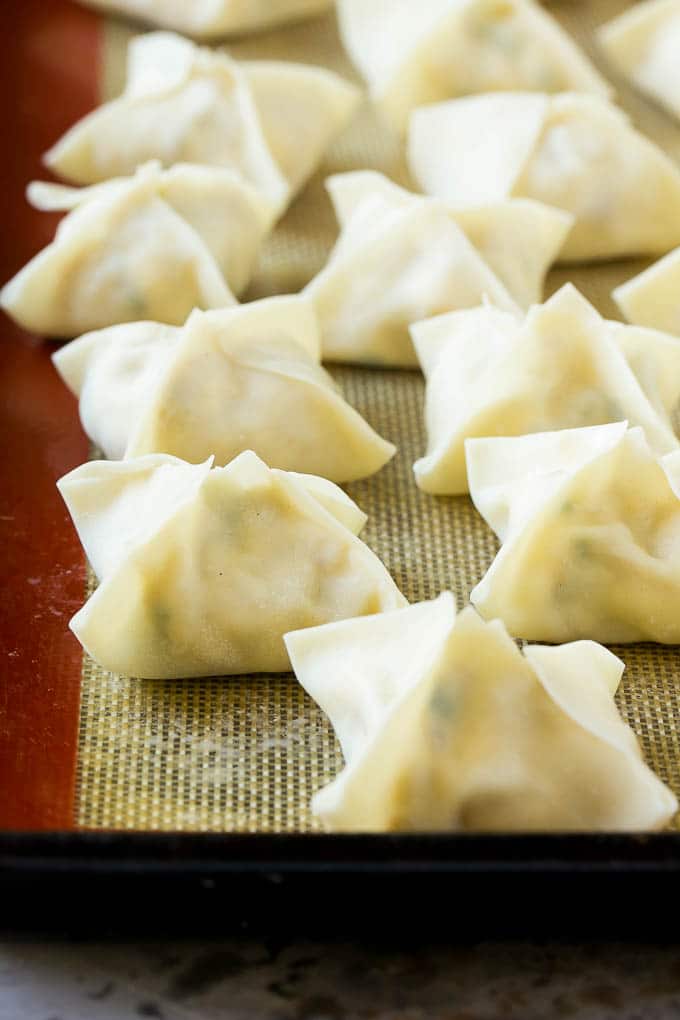 Raw wontons ready to go into the fryer.