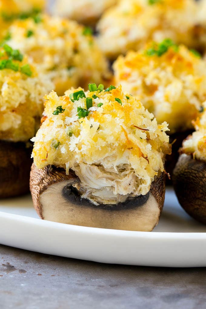 A cross section of a crab stuffed mushroom.