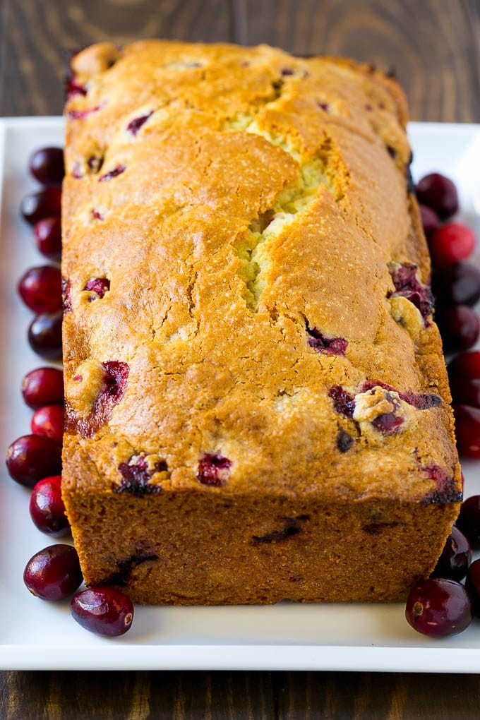 A baked loaf of fresh cranberry bread.
