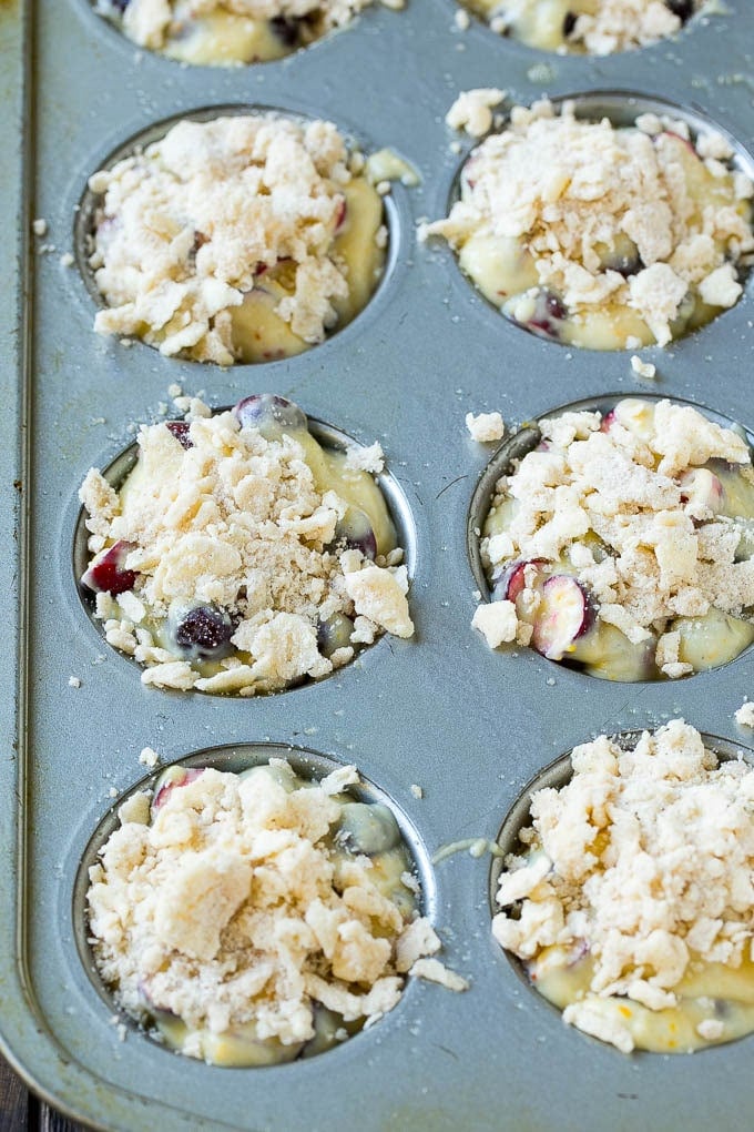 Muffins topped with streusel ready to go into the oven.