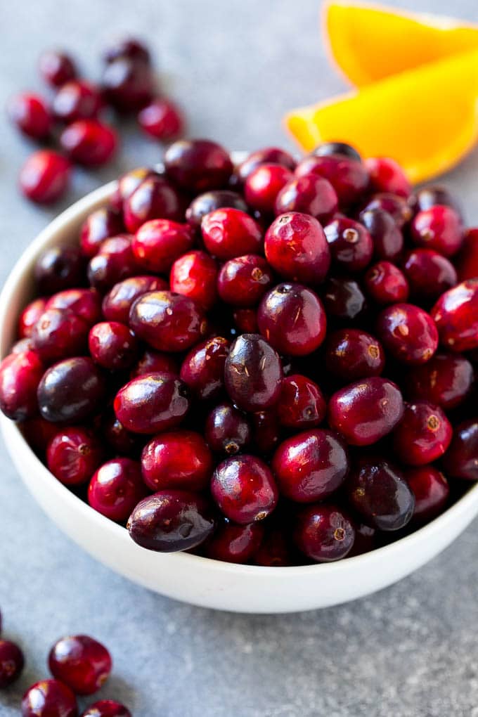 A bowl of fresh cranberries.