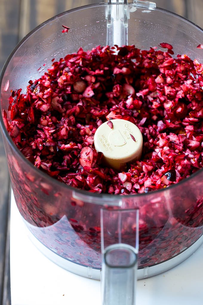 Chopped cranberries in a food processor.