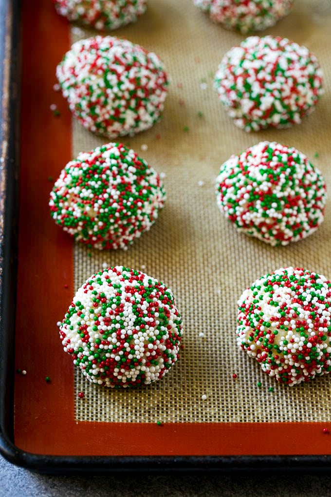 Balls of dough rolled in sprinkles.