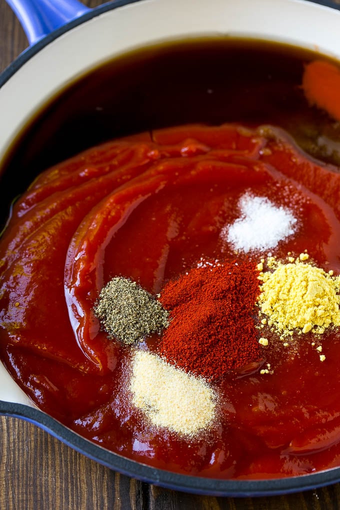 Ketchup. spices, vinegar and brown sugar in a skillet.