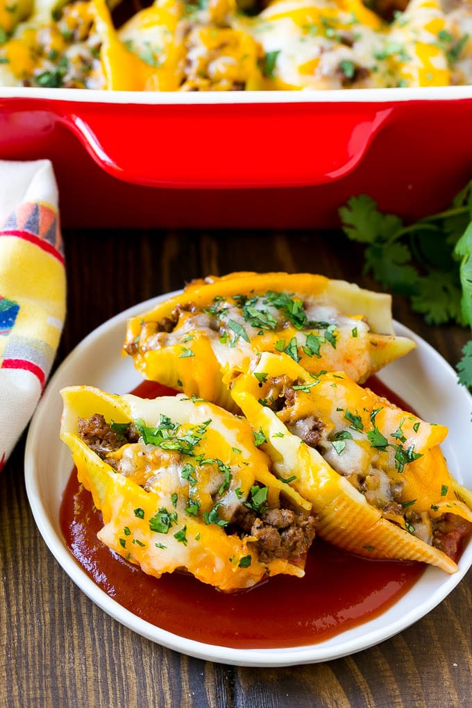 Mexican stuffed shells on a serving plate.