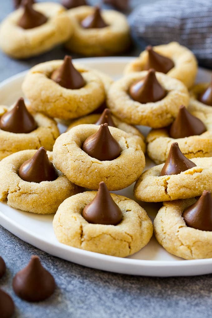 A serving plate of peanut butter blossoms.