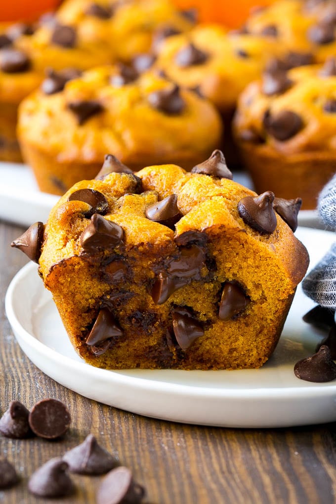 A cross section of a pumpkin chocolate chip muffin.