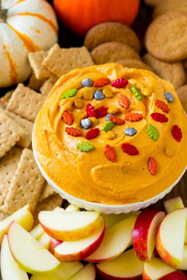 Pumpkin dip served with apples, gingersnap cookies and graham crackers.
