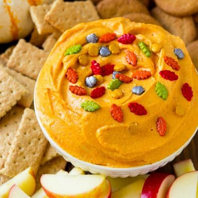 Pumpkin dip served with apples, gingersnap cookies and graham crackers.