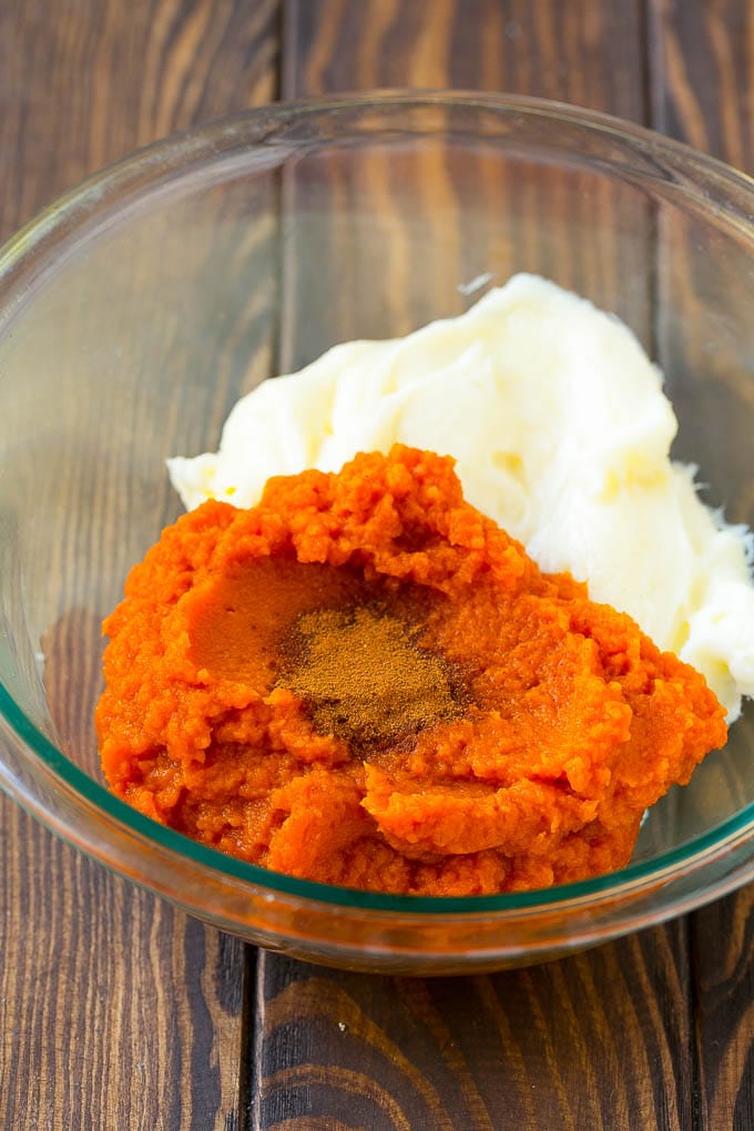 Pumpkin puree, cream cheese and spices in a bowl.