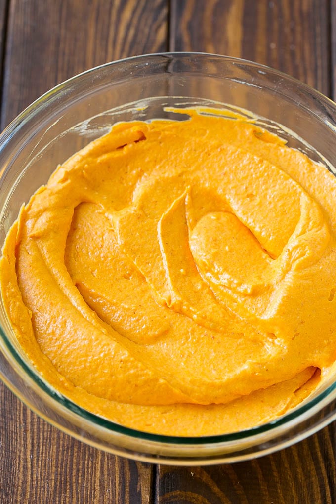 A bowl of fluffy pumpkin dip.