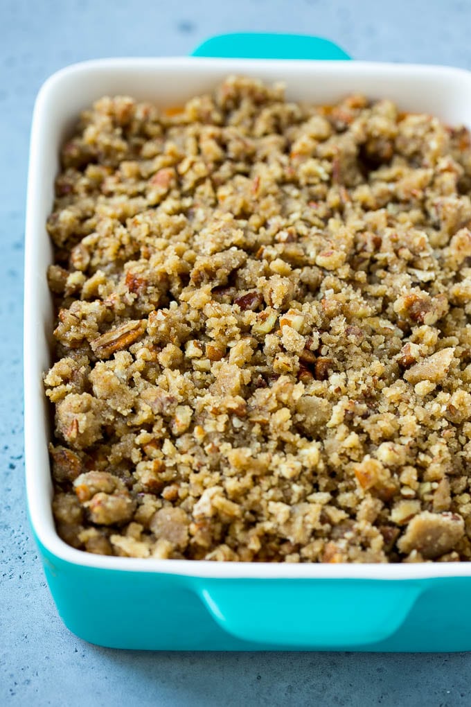 Mashed sweet potatoes topped with a brown sugar and pecan streusel.