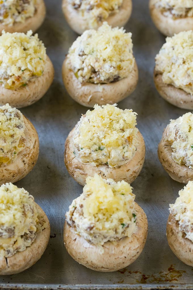 Raw sausage stuffed mushrooms ready to go into the oven.