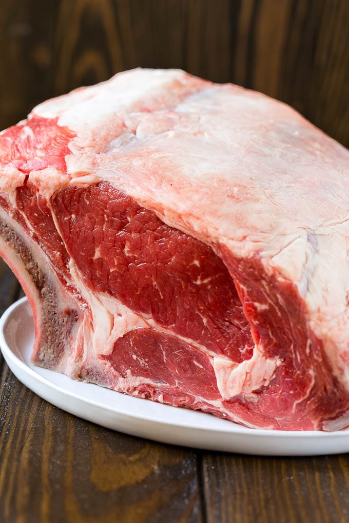 An uncooked standing rib roast.