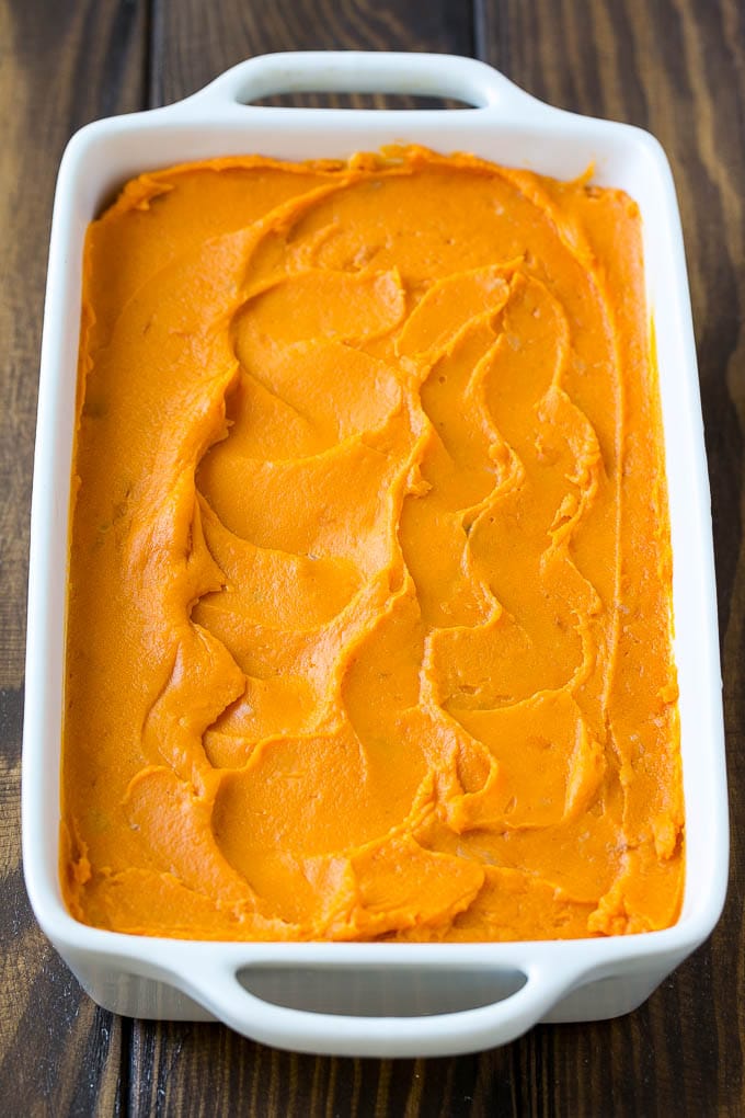 Mashed sweet potatoes in a baking dish.