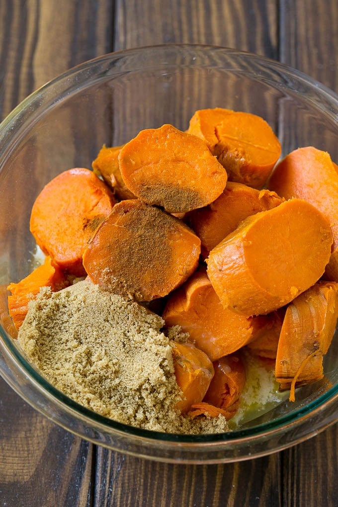 Sliced sweet potatoes with brown sugar, butter and spices.