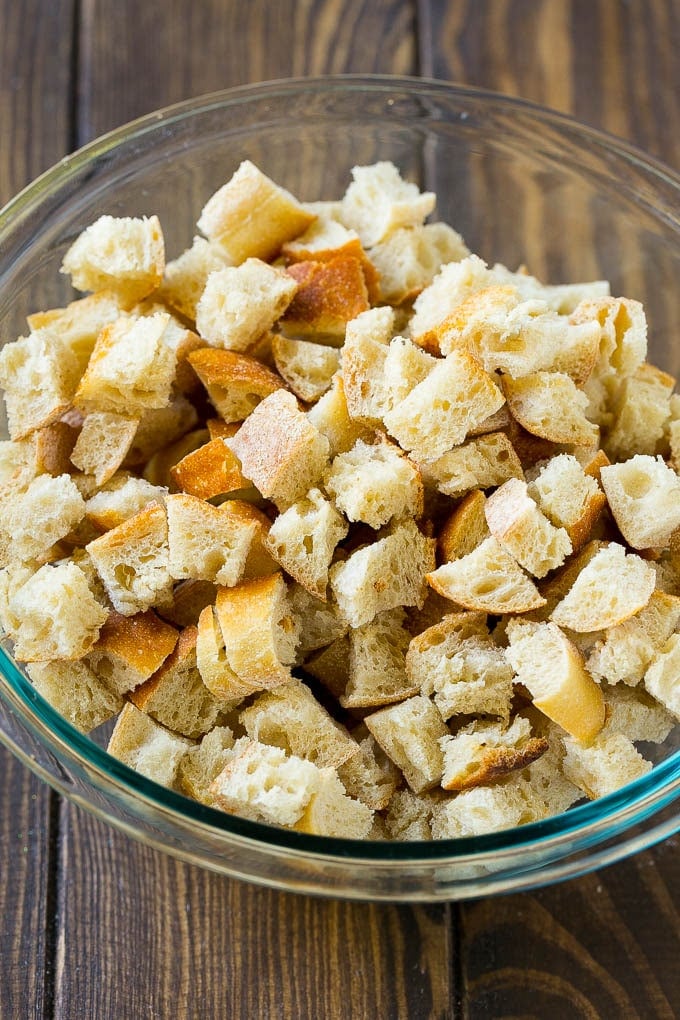 Dried bread cubes in a mixing bowl.