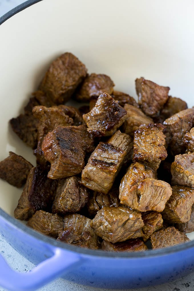 Vegetable Beef Soup Recipe | Beef Vegetable Soup | Beef Soup #beef #veggies #soup #dinner #glutenfree #dinneratthezoo Browned pieces of beef stew meat in a soup pot.