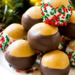 Buckeye balls on a serving platter garnished with sprinkles.