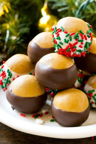 Buckeye balls on a serving platter garnished with sprinkles.