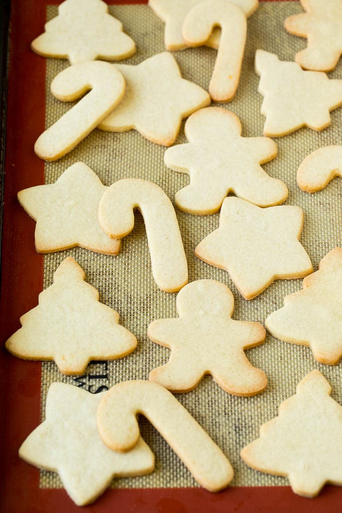 Cut out cookies on a sheet pan.