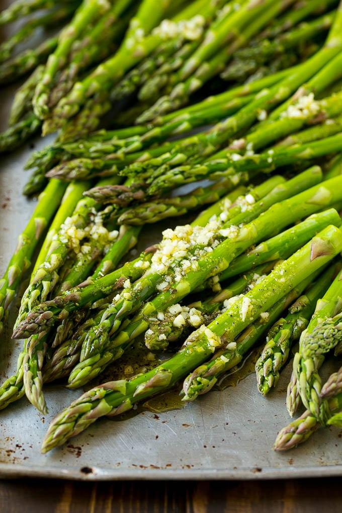 Raw spears drizzled with olive oil, garlic, herbs, salt and pepper.