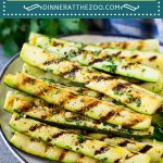 This grilled zucchini is bathed in a flavorful garlic and herb marinade, then cooked to perfection on the grill.