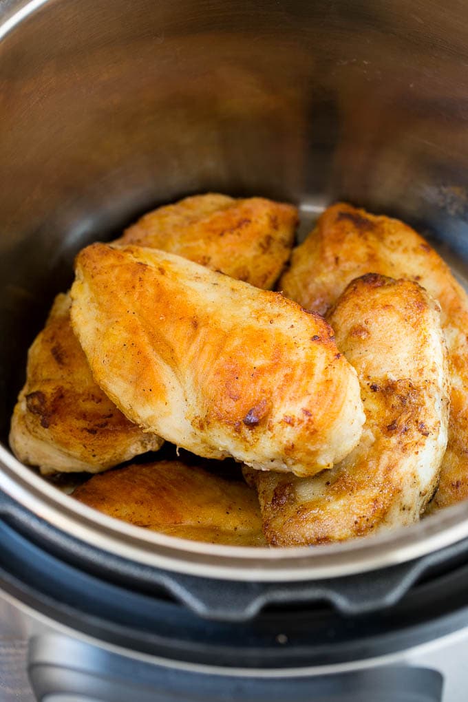 Sauteed chicken breasts in an Instant Pot.