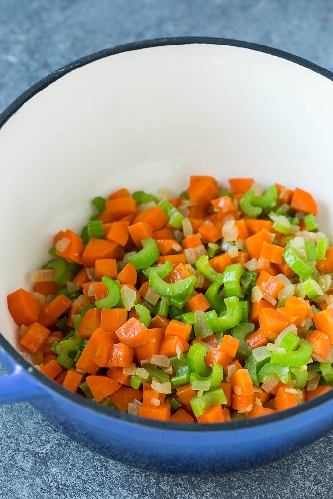 Carrpts, celery, onion and garlic in a soup pot.